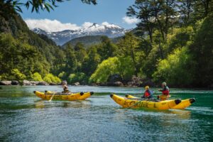 Earth River guests paddling through turquoise waters on the Futaleufu River in Chile